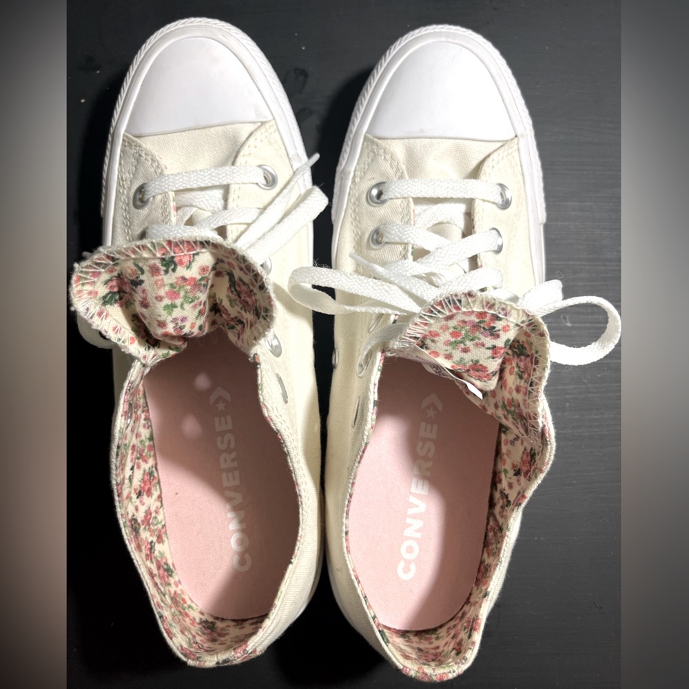 Converse-All Star cream colored w/ floral inside.